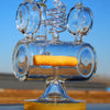 Elaborate clear glass pipe with yellow insert in Recycler Style Inline Percolator design