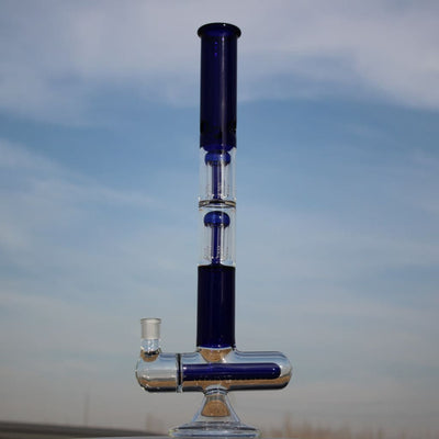 Dual arm percolated glass water bong with blue and clear sections, featuring a percolator