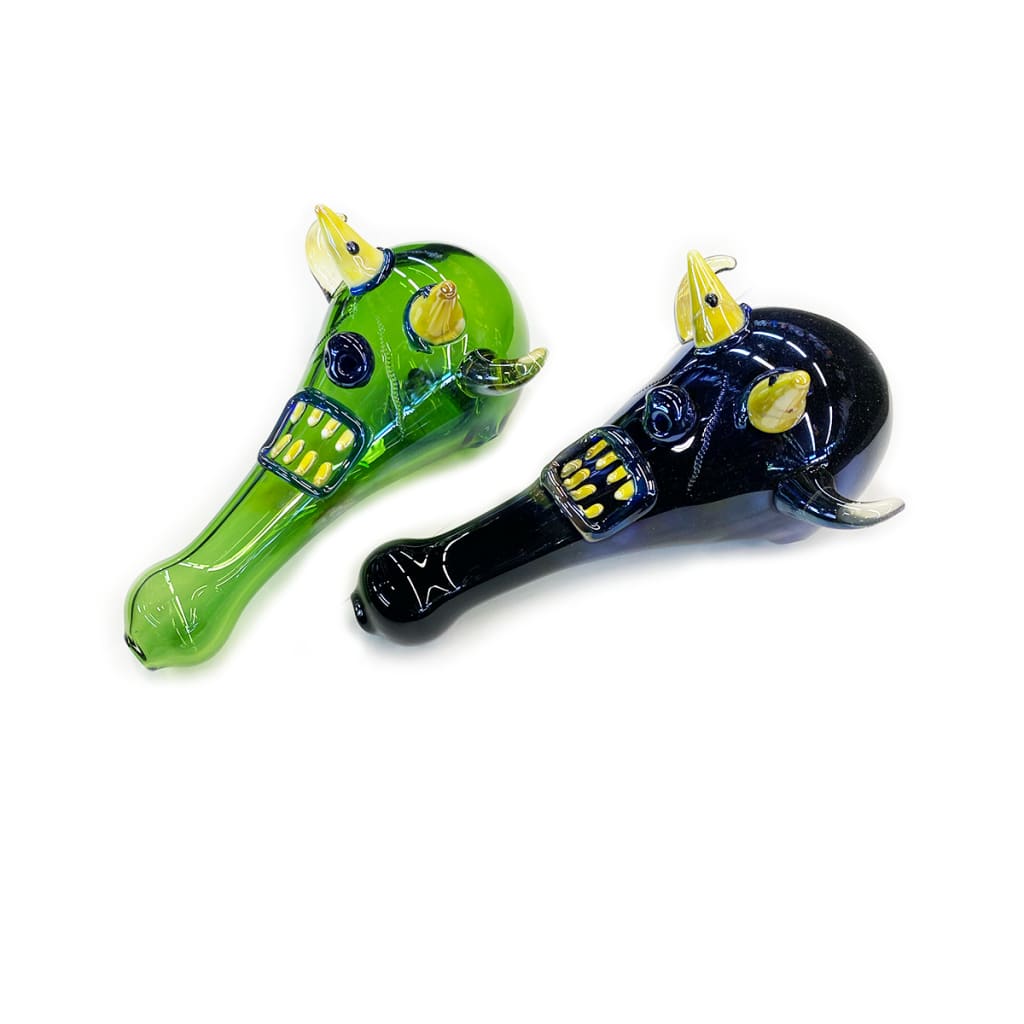 Devil hand pipe with green and black animal skulls, featuring bold 2D art details