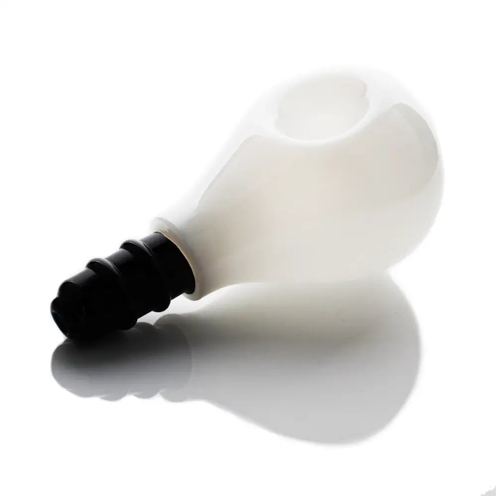 Frosted glass bulb hand pipe spoon lying on its side with reflection for easy use