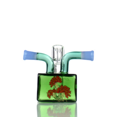 Glass water pipe rig with green base and double mouthpiece featuring 14mm male banger