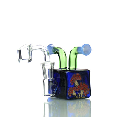 Glass water pipe rig with double mouthpiece and colorful mushroom design, 14mm male banger