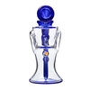 Glass perfume bottle with blue accents and round stopper on Opal Mini Recycler Dab Rig