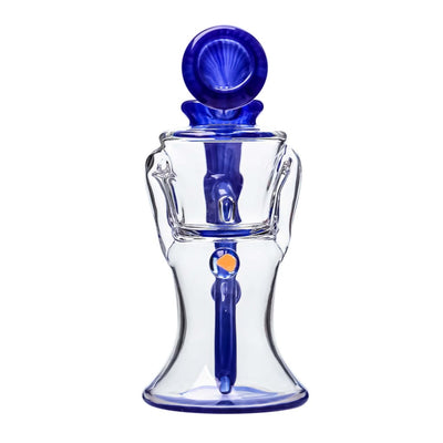 Glass perfume bottle with blue accents and round stopper on Opal Mini Recycler Dab Rig