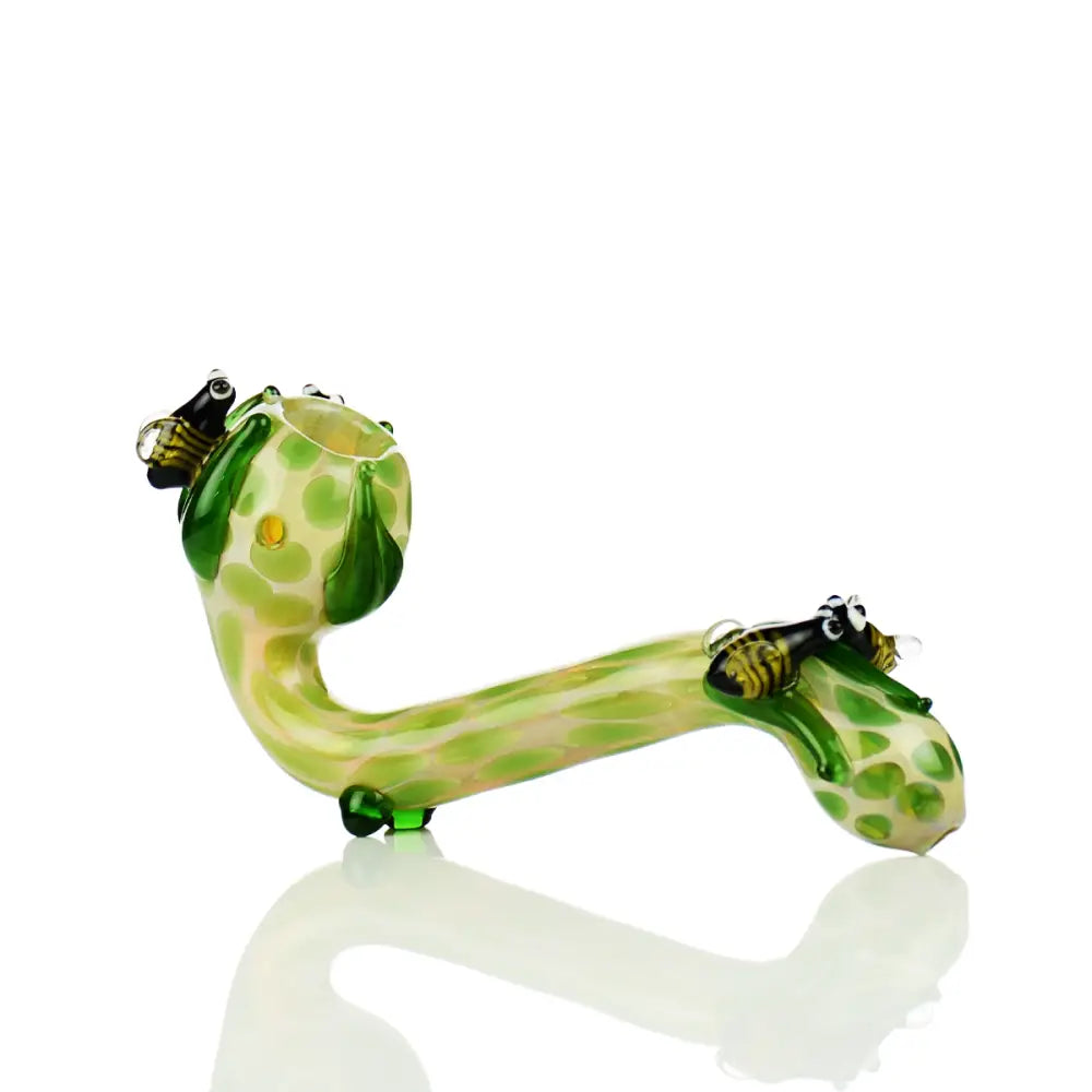 Sherlock Glass Pipe shaped like a snake with frog features in vibrant green and yellow