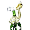 Ornate Turtle Rig water pipe with green accents and 14mm male quartz banger