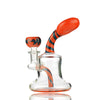 Glass water pipe with orange and blue striped accents for smooth sessions in color reversal glass