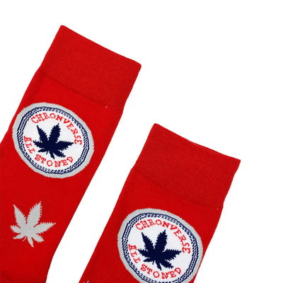Red Atoned Socks with circular logo and marijuana leaf designs for perfect fit and comfort