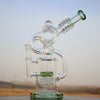 Intricate Glass Ergonomic Recycler Style Water Pipe With Green Accents And Angled Mouthpiece