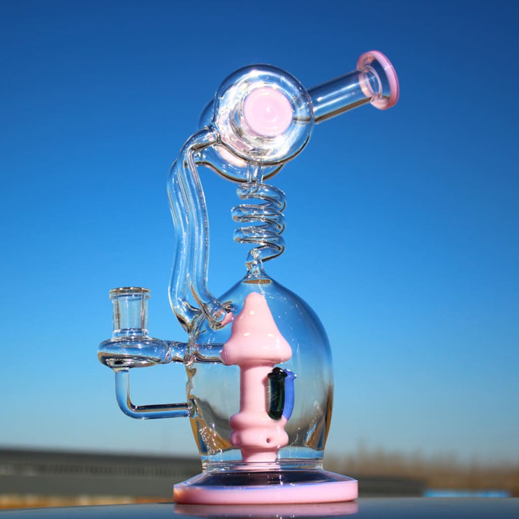 Mushroom recycler water pipe with pink accents, spiral design, and circ perc features