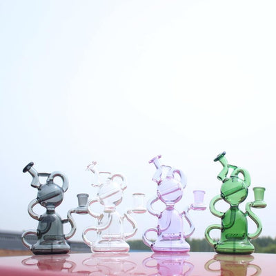 Four colorful glass bongs for a smooth smoking experience with our mini water pipe recycler style