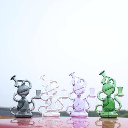 Four colorful glass bongs for a smooth smoking experience with our mini water pipe recycler style