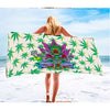 Generously sized panicbeach towel with cannabis leaf pattern and calming message design