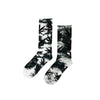 Pair of black and white tie dye socks featuring a marijuana leaf pattern for comfort