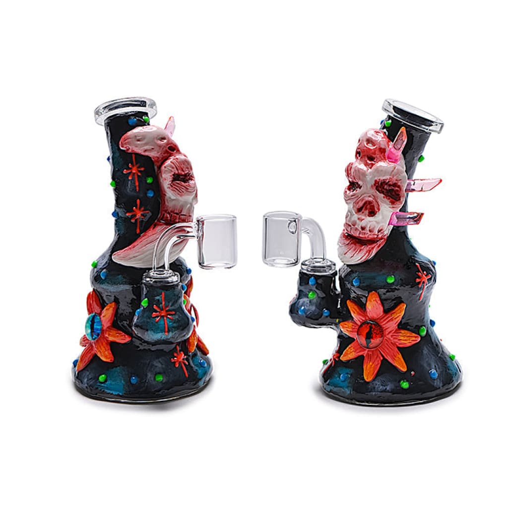 Colorful glass water pipes decorated with skull designs and floral patterns.