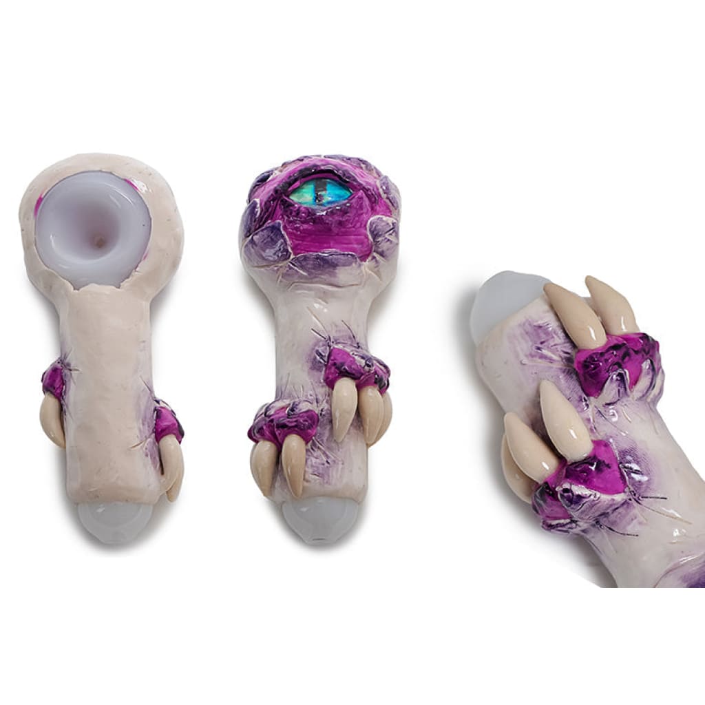 Glass Monster Teeth Handpipe featuring pink and purple decorative accents for spooky sessions
