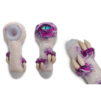 Glass Monster Teeth Handpipe featuring pink and purple decorative accents for spooky sessions