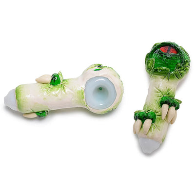 Glass Monster Teeth Handpipe featuring green frog designs for spooky smoke sessions