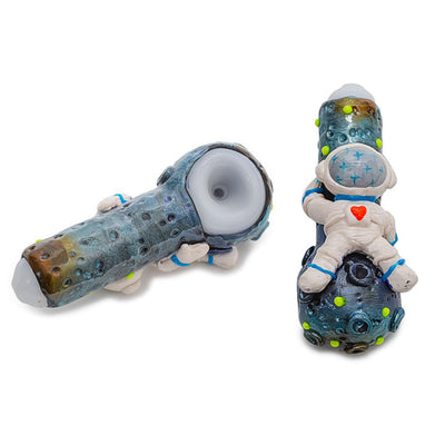 Whimsical clay spaceman riding a rocket handpipe from the Interstellar Spaceman collection