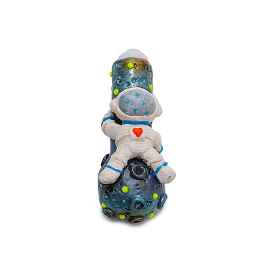 Decorative clay spaceman handpipe with cosmic design featuring a small astronaut toy
