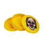 Yellow plastic grinder with scary clown face lid from Coleccionables De Picadores Para Aventuras y Humo