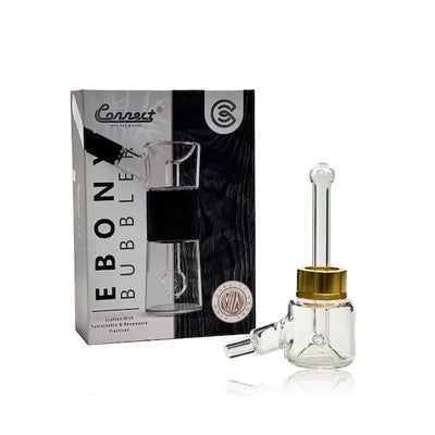 Glass bubbler with packaging from Connect Wood Collection, showcasing hand-blown glass design