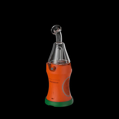 Glass bong with orange silicone sleeve and green base from Anwar Carrots Dabber Boost Evo