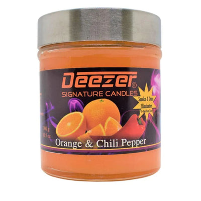 Scented candle jar labeled ’Deezer Signature Candles’ in Orange & Chili Pepper fragrance
