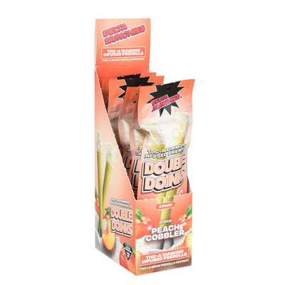 Display box of Delta Munchies Double Doink THC-A Pre-rolls peach cobbler cigar wraps