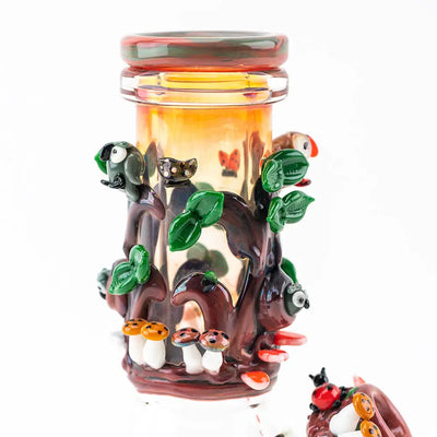 Empire Glassworks Baby Beaker Redwood Bong with vibrant forest design