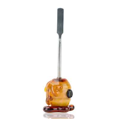 Empire Glassworks beehive dab tool in borosilicate glass with amber bong