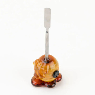 Empire Glassworks beehive dab tool in borosilicate glass, amber honeycomb design