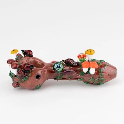 Empire Glassworks Bug’s Life glass spoon pipe with log, mushroom, beetle design