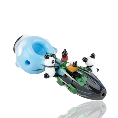 Empire Glassworks climbing pandas spoon pipe with translucent blue black glass and three panda figurines on green leafy design