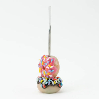 Empire Glassworks donut dab tool in borosilicate glass with pink frosting and rainbow sprinkles