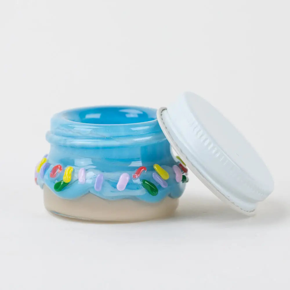 Empire Glassworks donut terp jar with blue translucent body and sprinkle rim