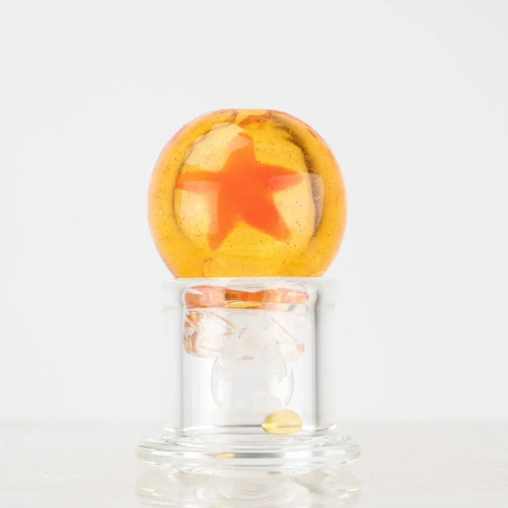 Empire Glassworks Dragon Sphere Spinner Carb Cap with amber glass star design