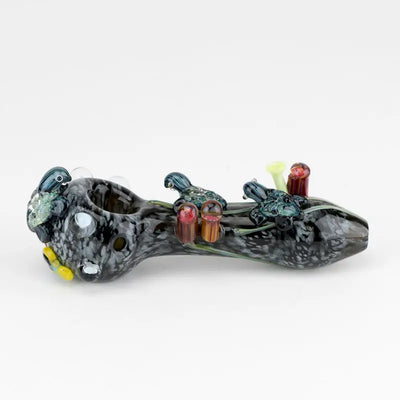 Empire Glassworks East Australian Current spoon pipe with colorful marbled glass figurines