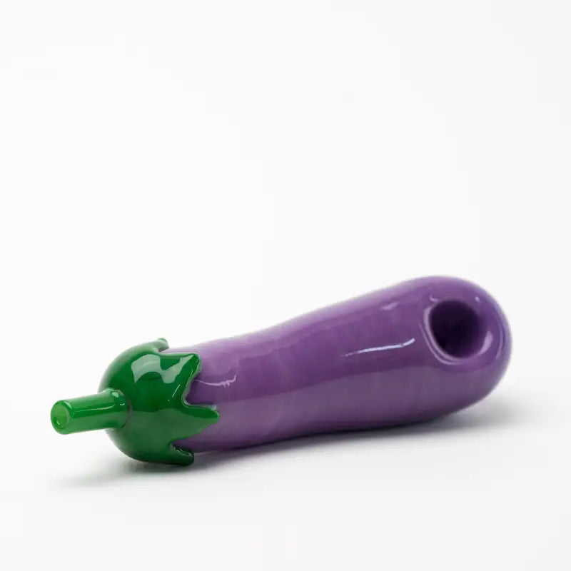 Empire Glassworks eggplant glass hand pipe with purple glass and green stem
