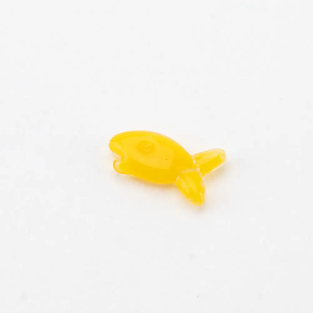 Empire Glassworks lucky cat spinner cap with translucent yellow plastic fish charm