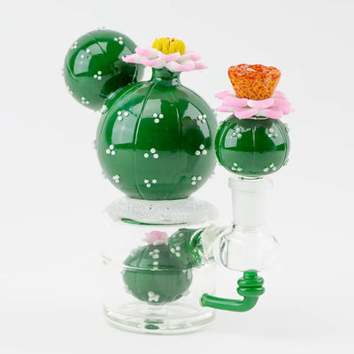 Empire Glassworks mini dab rig with green cactus bong and flowers