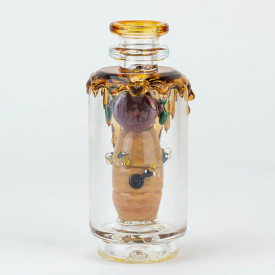 Empire Glassworks Peak Attachment Save the Bees golden amber glass bottle with honeycomb bee motif