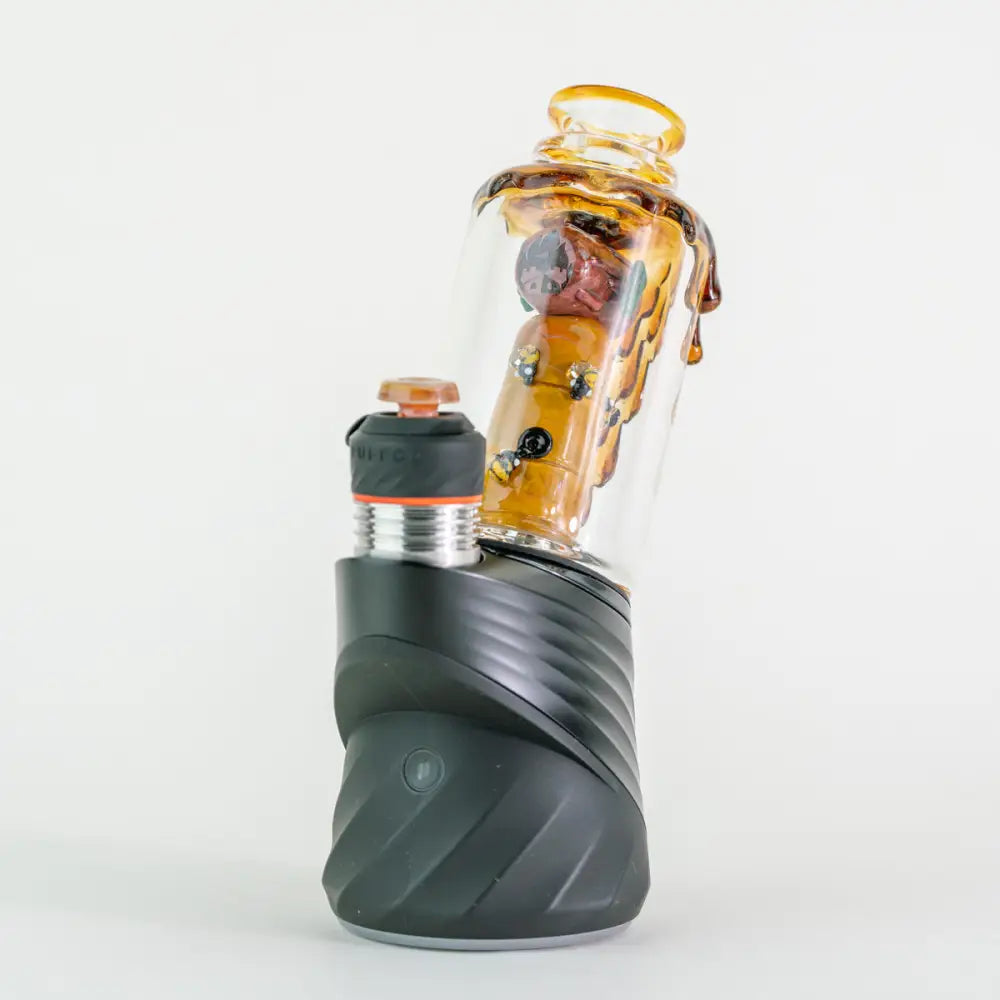 Empire Glassworks Peak Attachment Save the Bees vape with amber liquid