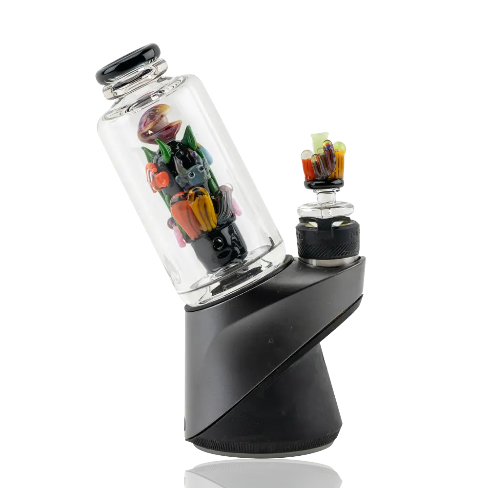 Sleek black Empire Glassworks Peak Attachment vaporizer with colorful sea figurines