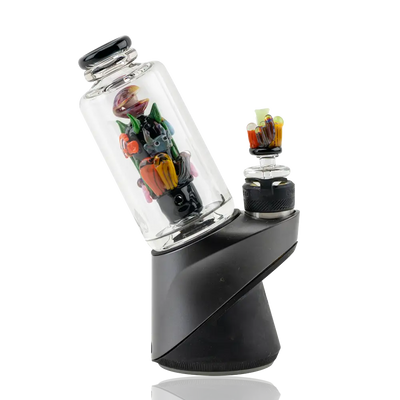 Sleek black Empire Glassworks Peak Attachment vaporizer with colorful sea figurines