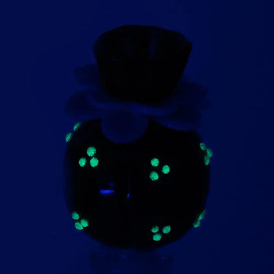 Empire Glassworks Peyote Cactus black glass perfume bottle with glowing green dots
