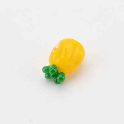 Empire Glassworks pineapple themed carb cap with yellow glass carrot charm