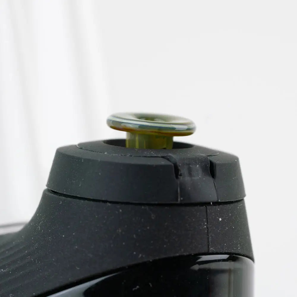 Empire Glassworks proxy glass joystick cap for Puffco Proxy, black plastic with greenish-yellow top