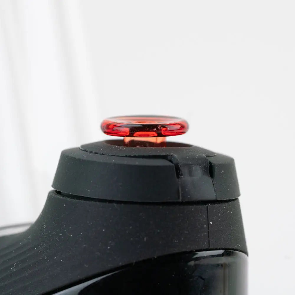 Black textured Empire Glassworks Proxy Glass Joystick cap with red button