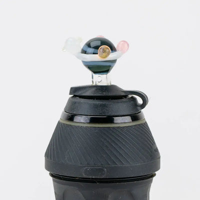 Black silicone Puffco Proxy bottle with Empire Glassworks galactic colorful topper